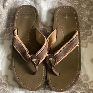 margaritaville flip flops with guitar on bottom